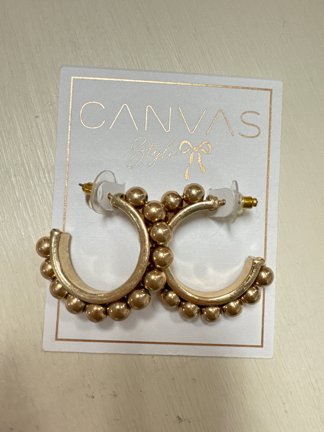 Gold beaded hoop earrings 