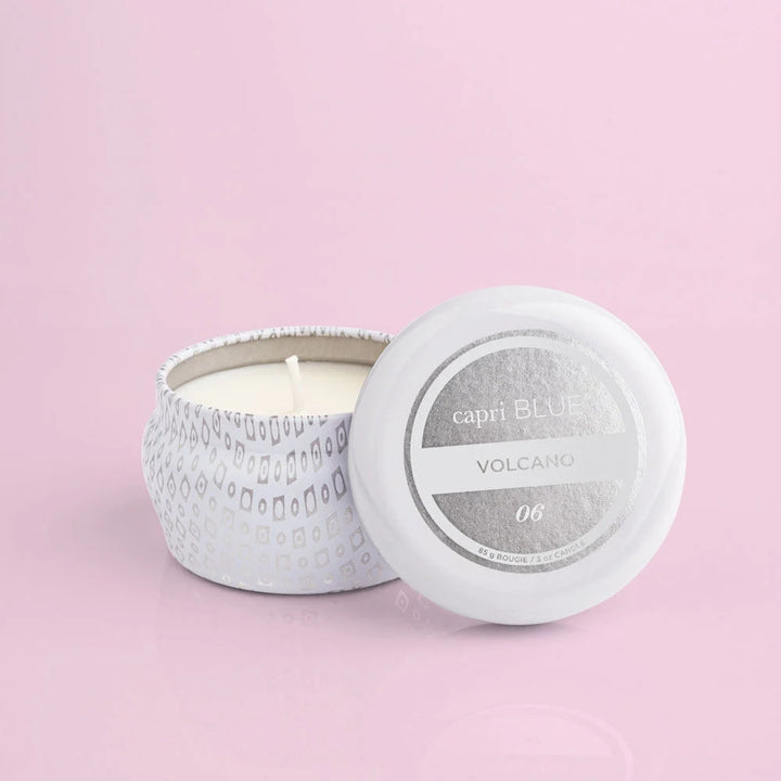 Capri Blue volcano white printed mini tin candles showing candle open