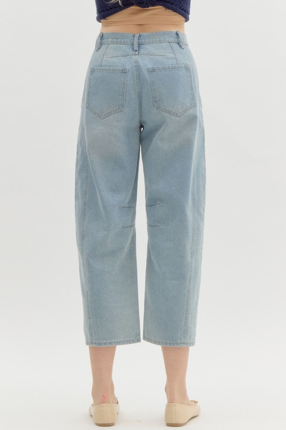 Women's Entro Brand light washed denim barrel jeans showing back view