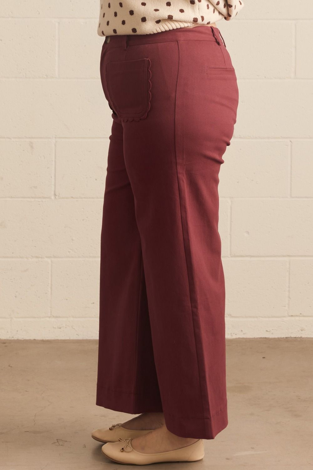 Entro plus twill denim wide leg pants with scalloped details and a flattering fit in burgundy 