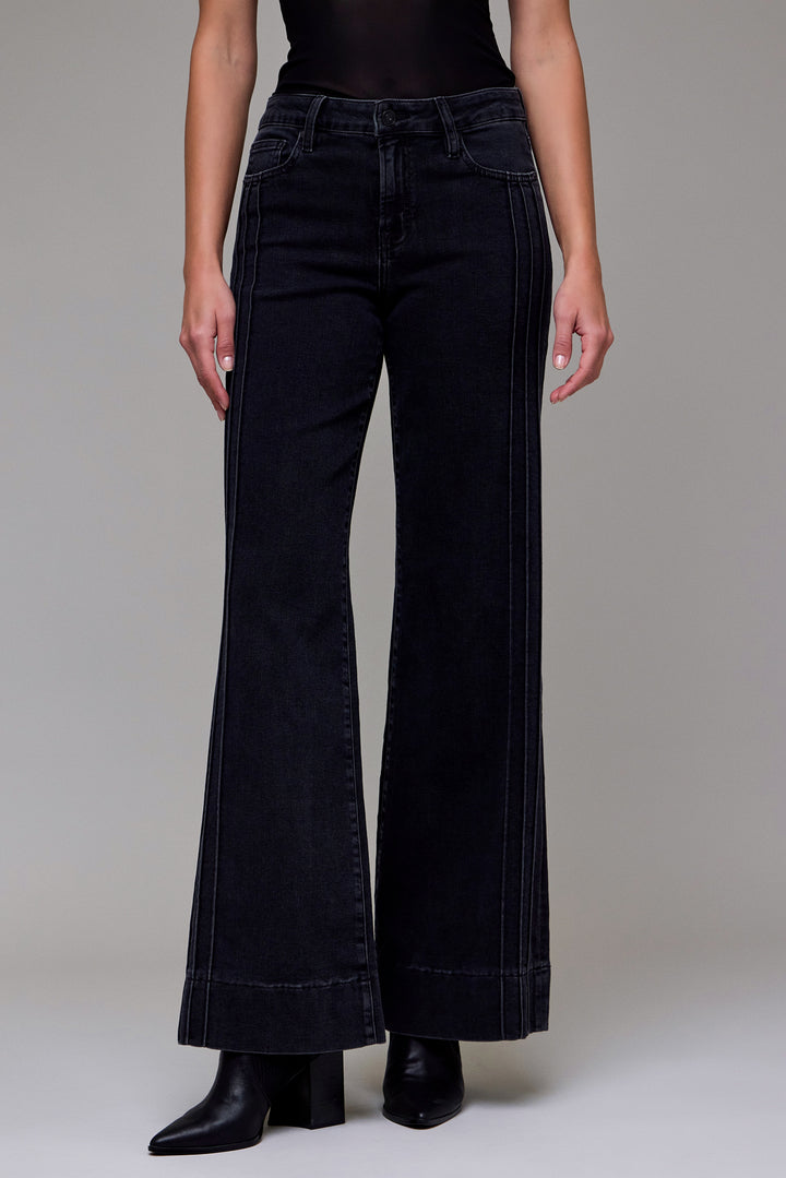 Hidden Jeans black mid-rise flare jeans styled with boots