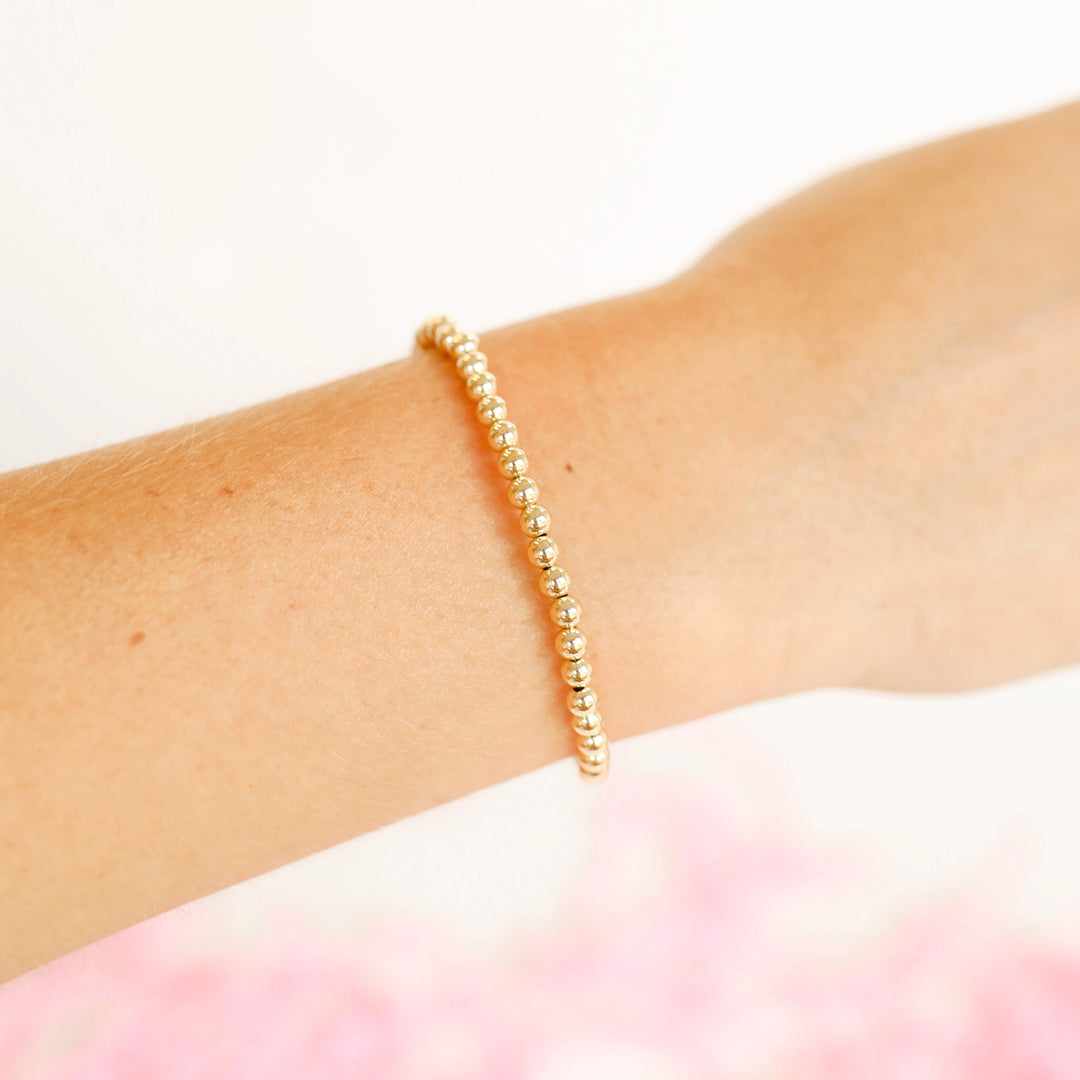 Beaded Blondes Kids 4mm beaded stackable bracelets shown on a person

