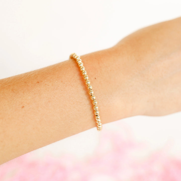 Beaded Blondes Kids 4mm beaded stackable bracelets shown on a person
