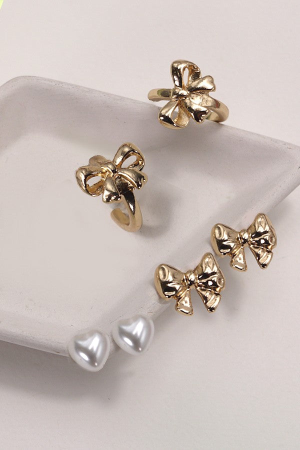 set of 3 gold pearl and bow earrings
