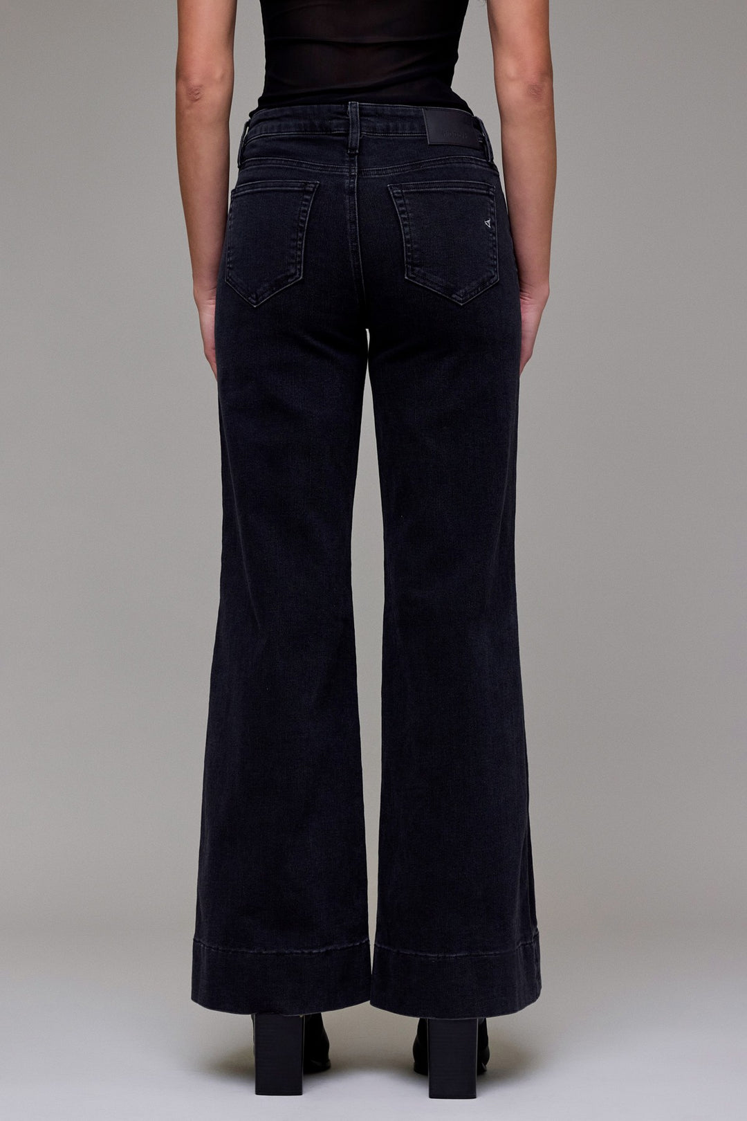Back view of Hidden Jeans black denim flare jeans for women