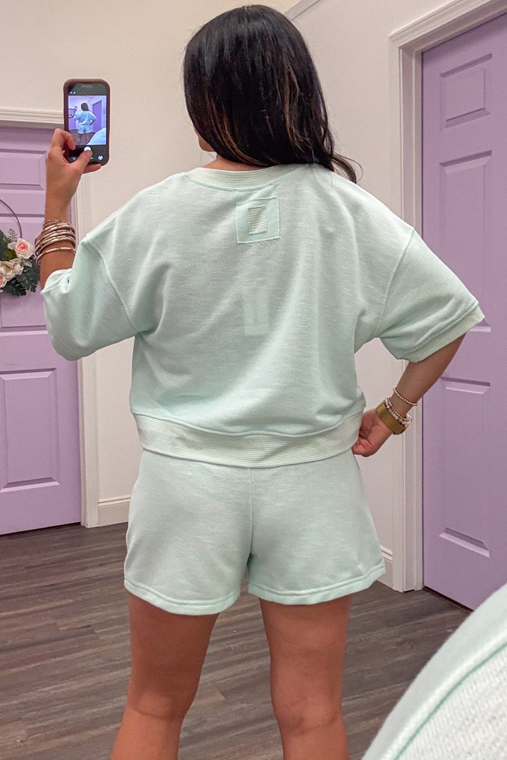 aqua with striped mint trim short sleeve crew neckline terry knit top