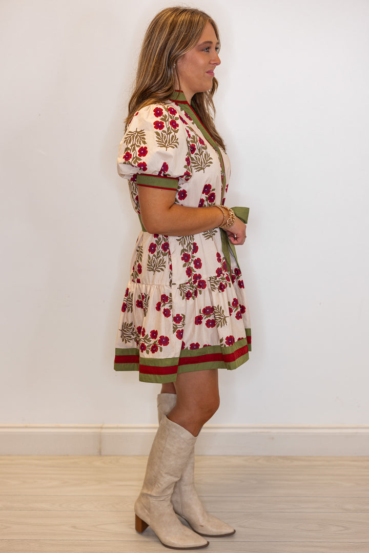 Women's ecru, burgundy and olive floral button down dress with a belted waist by Entro showing full side view