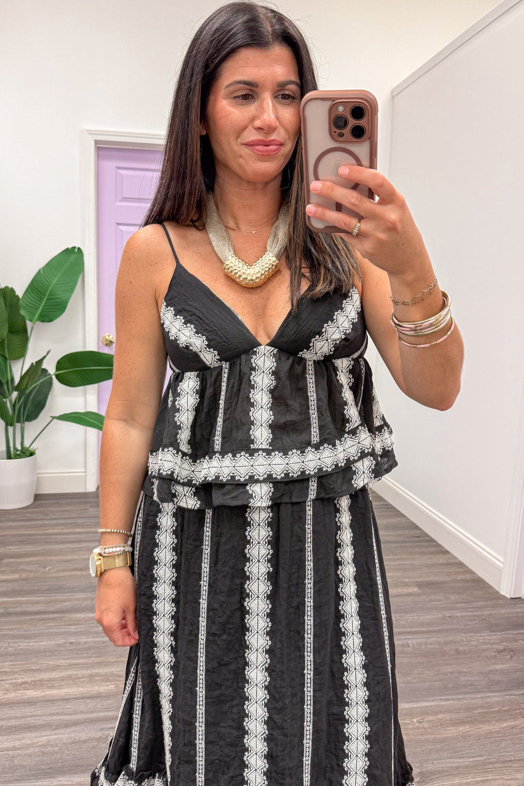 black with cream embroidered striped details sleeveless peplum top