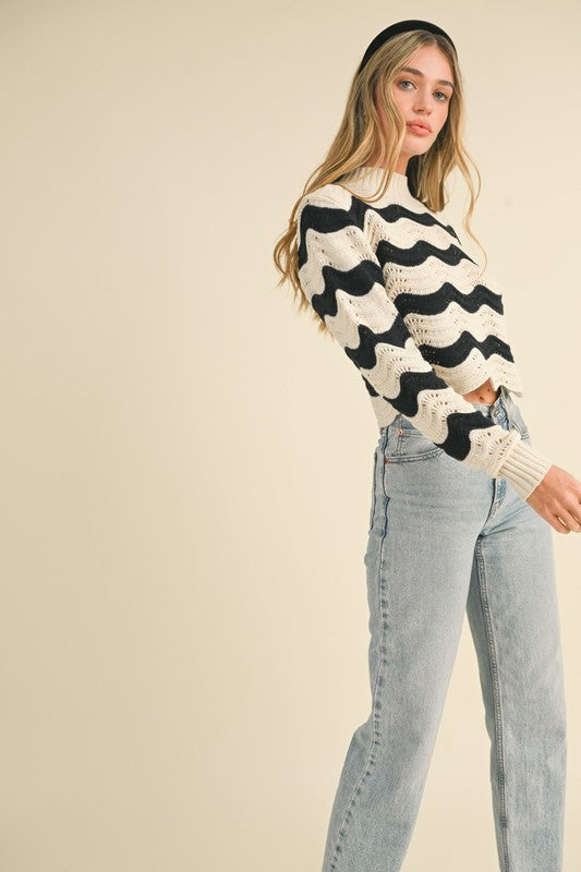 &merci Black and ivory wave striped sweater knit top with scalloped eyelet details