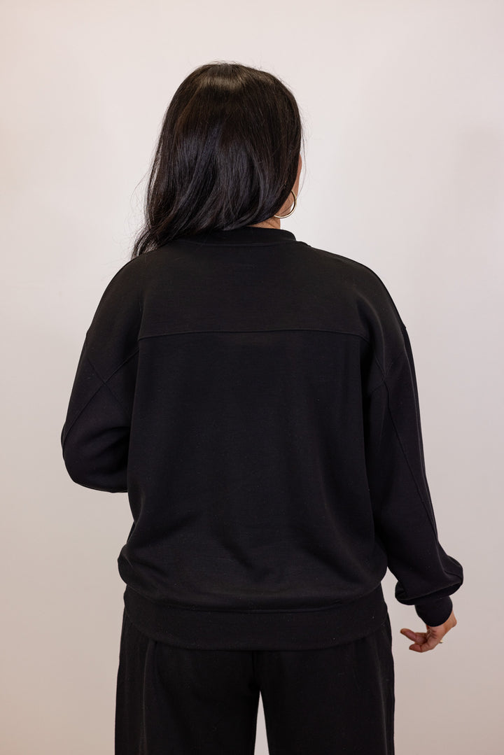 black scuba knit crew neck pullover