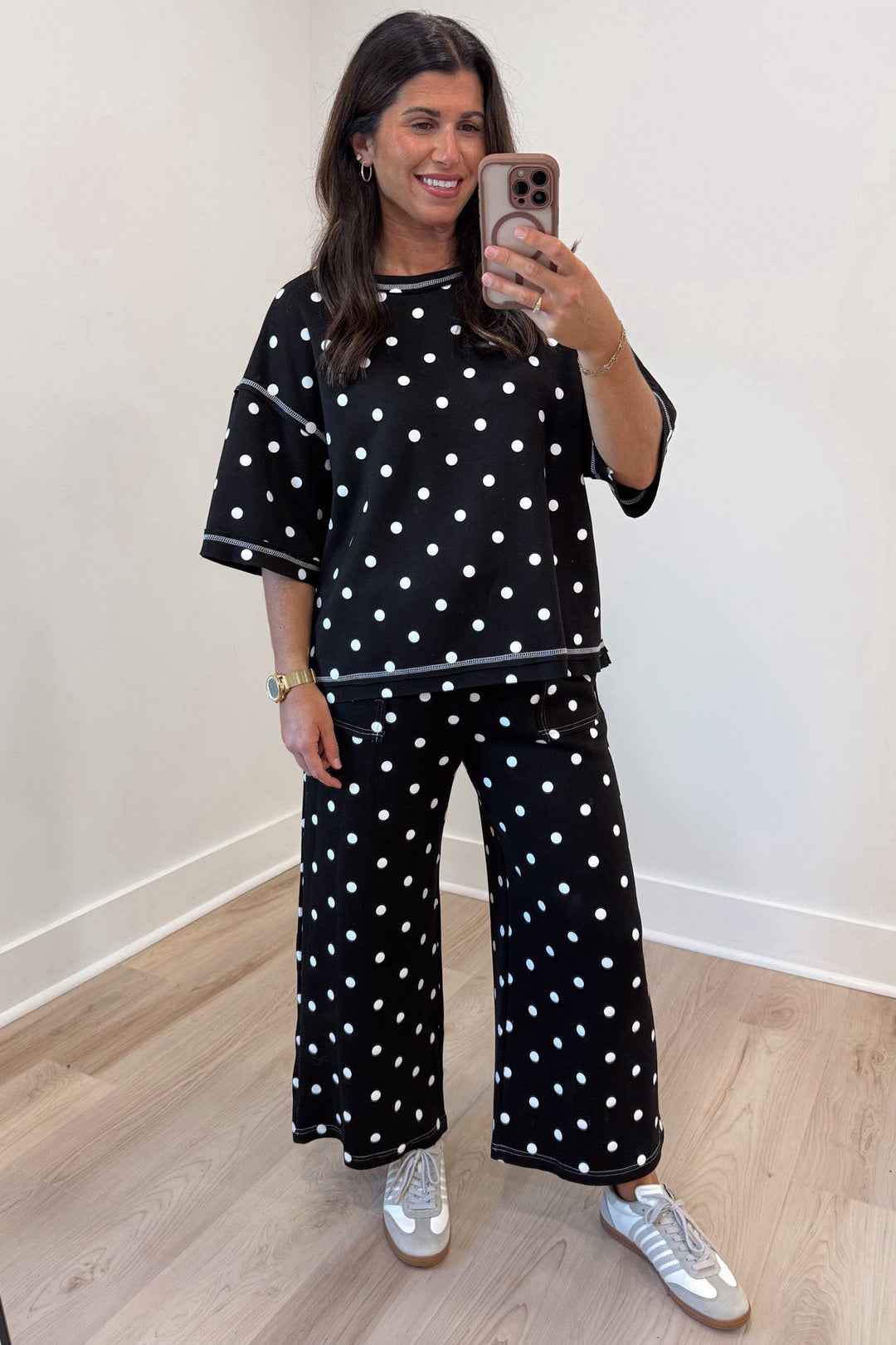 black with white polka dot print relaxed silhouette top and pants matching knit set