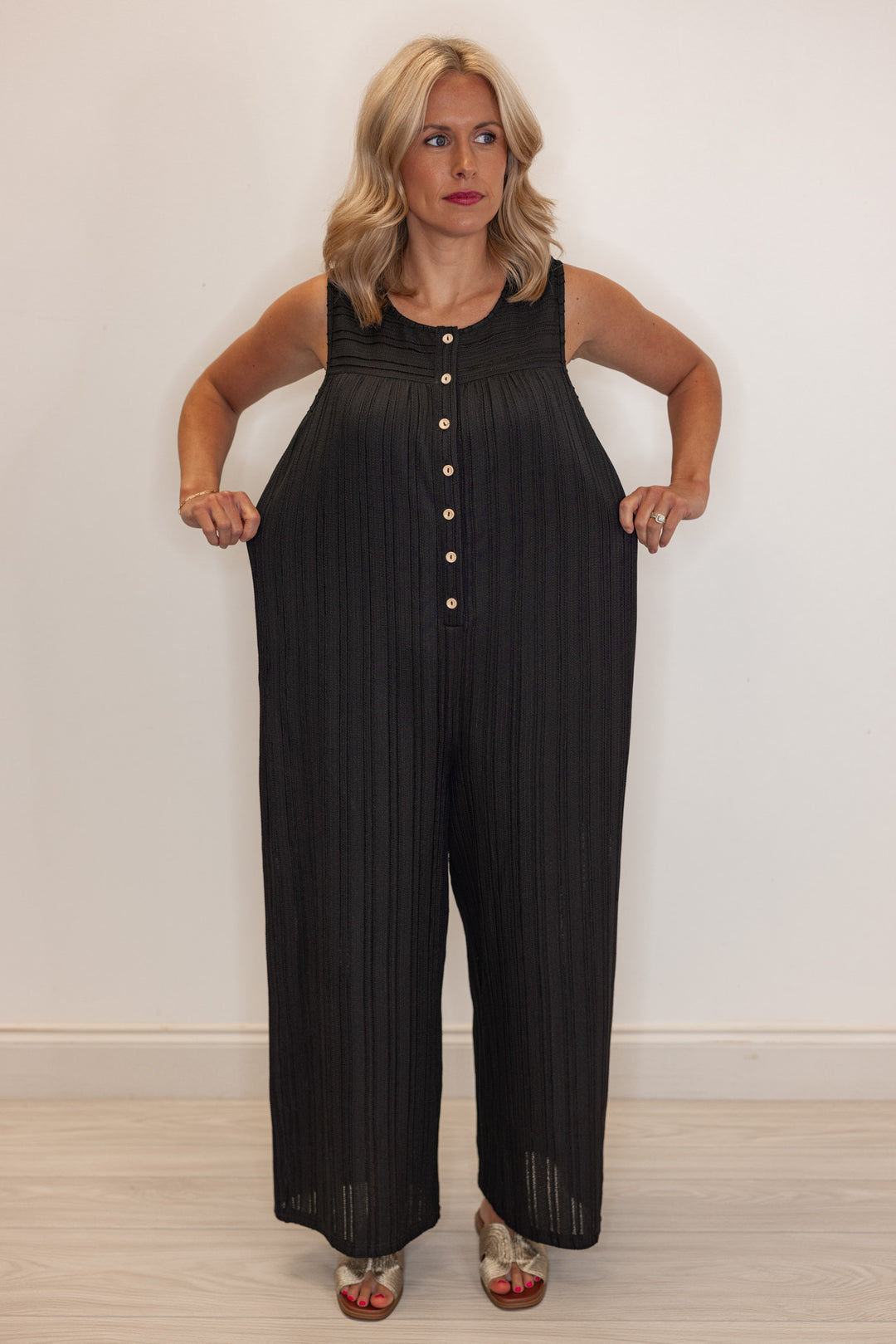 Women's black textured summer romper by Jodifl showing full stretch 