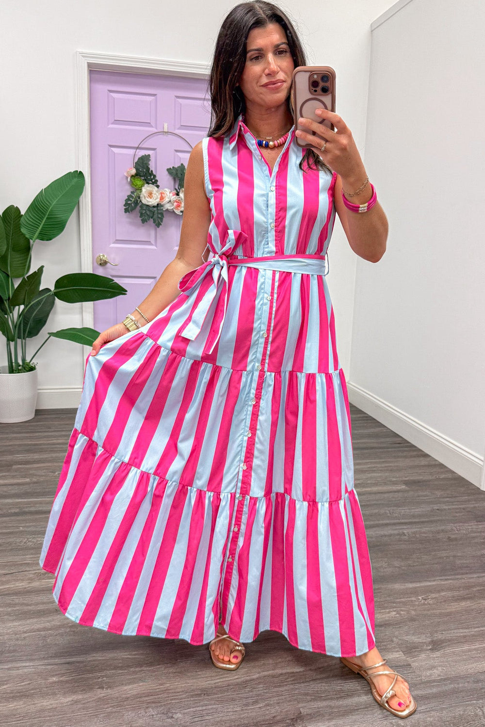 blue and pink striped sleeveless button down belted midi dress with flowy tiered skirt