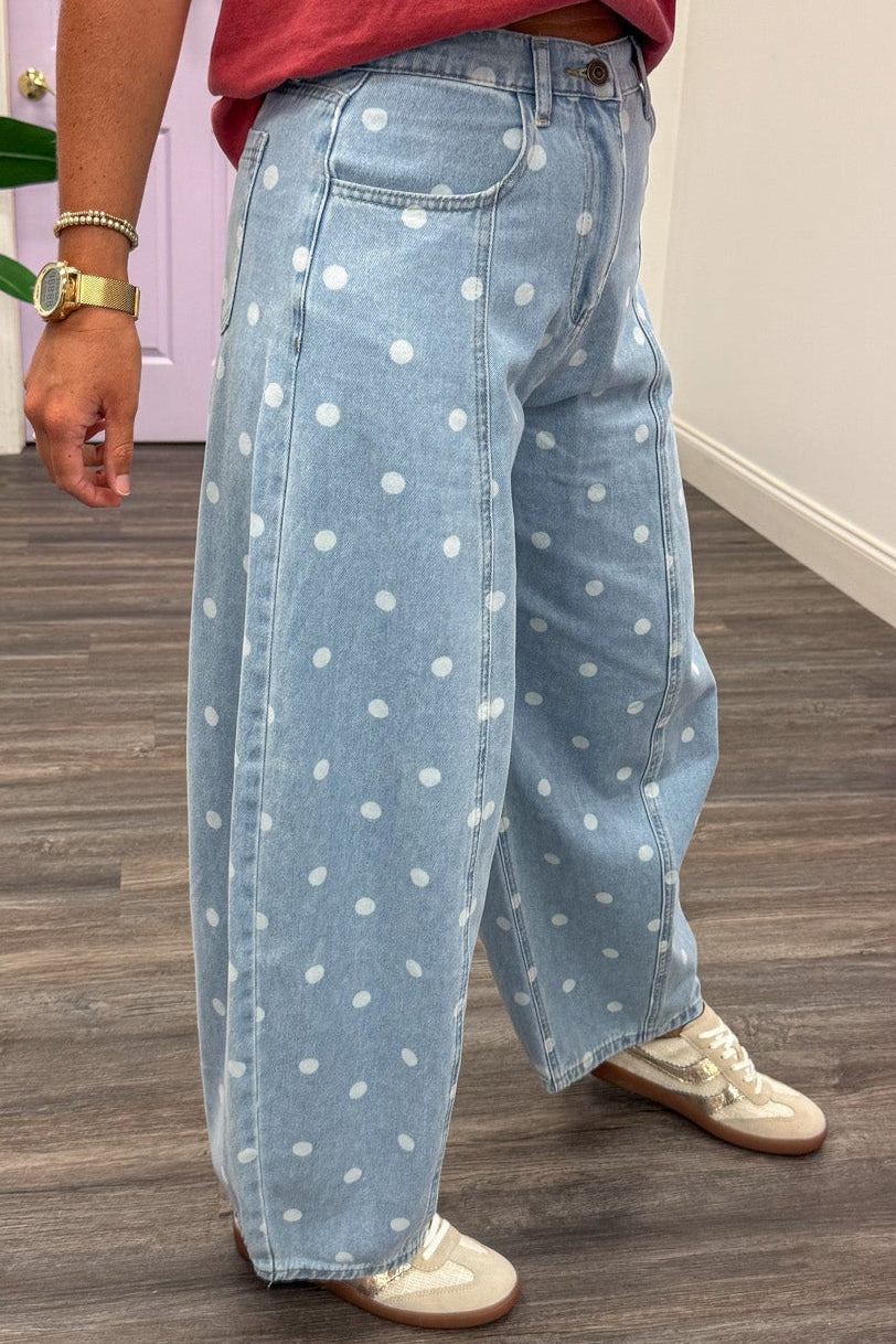 light blue washed denim with white polka dot print and reverse seam details wide leg barrel pants