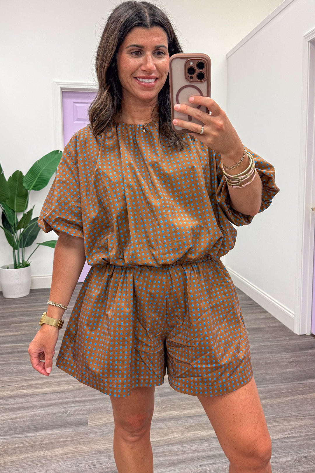 brown with small blue polka dot print bubble hem semi-cropped cotton poplin top