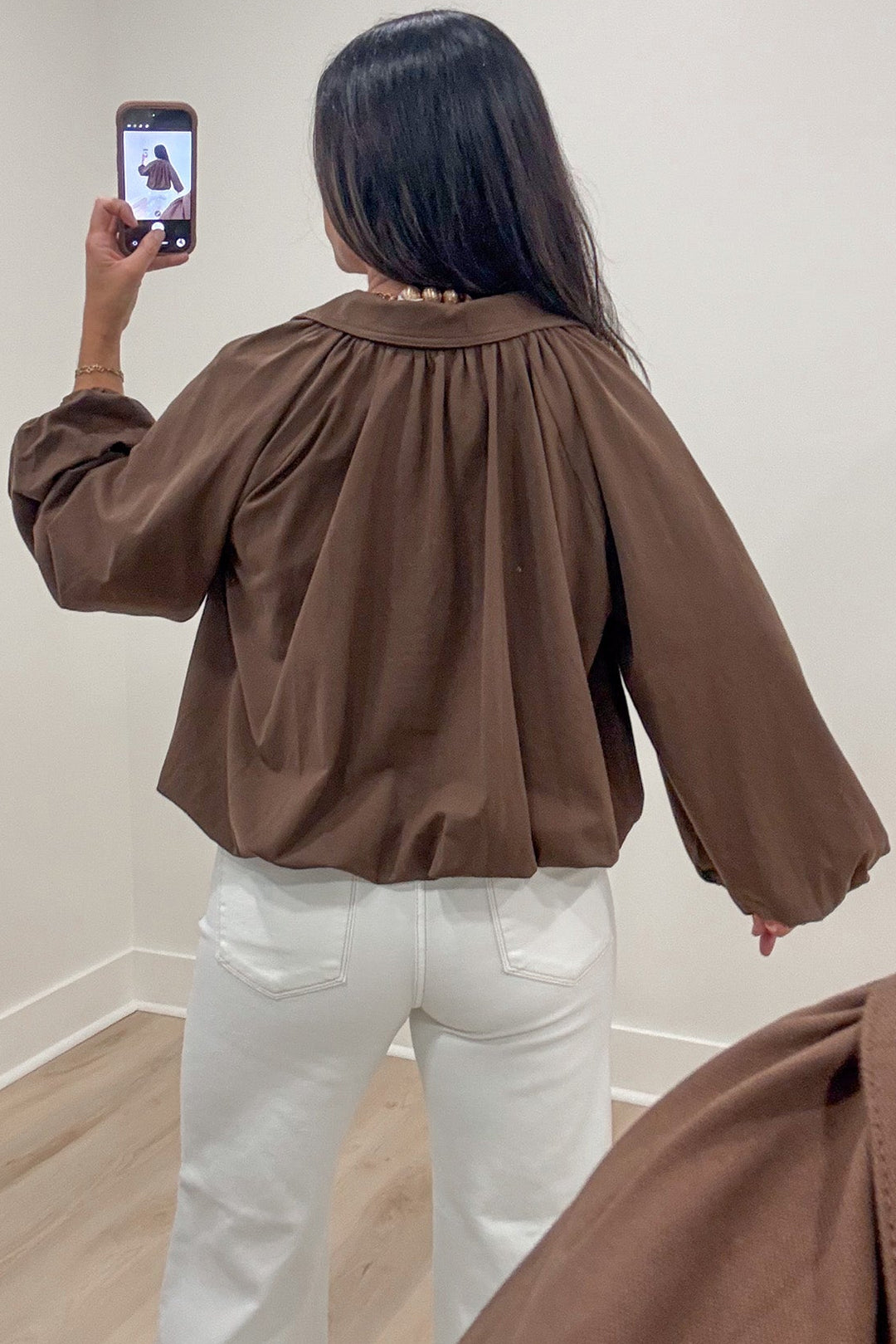 solid brown long sleeve bubble hem zipper front semi-cropped lightweight jacket with side pockets