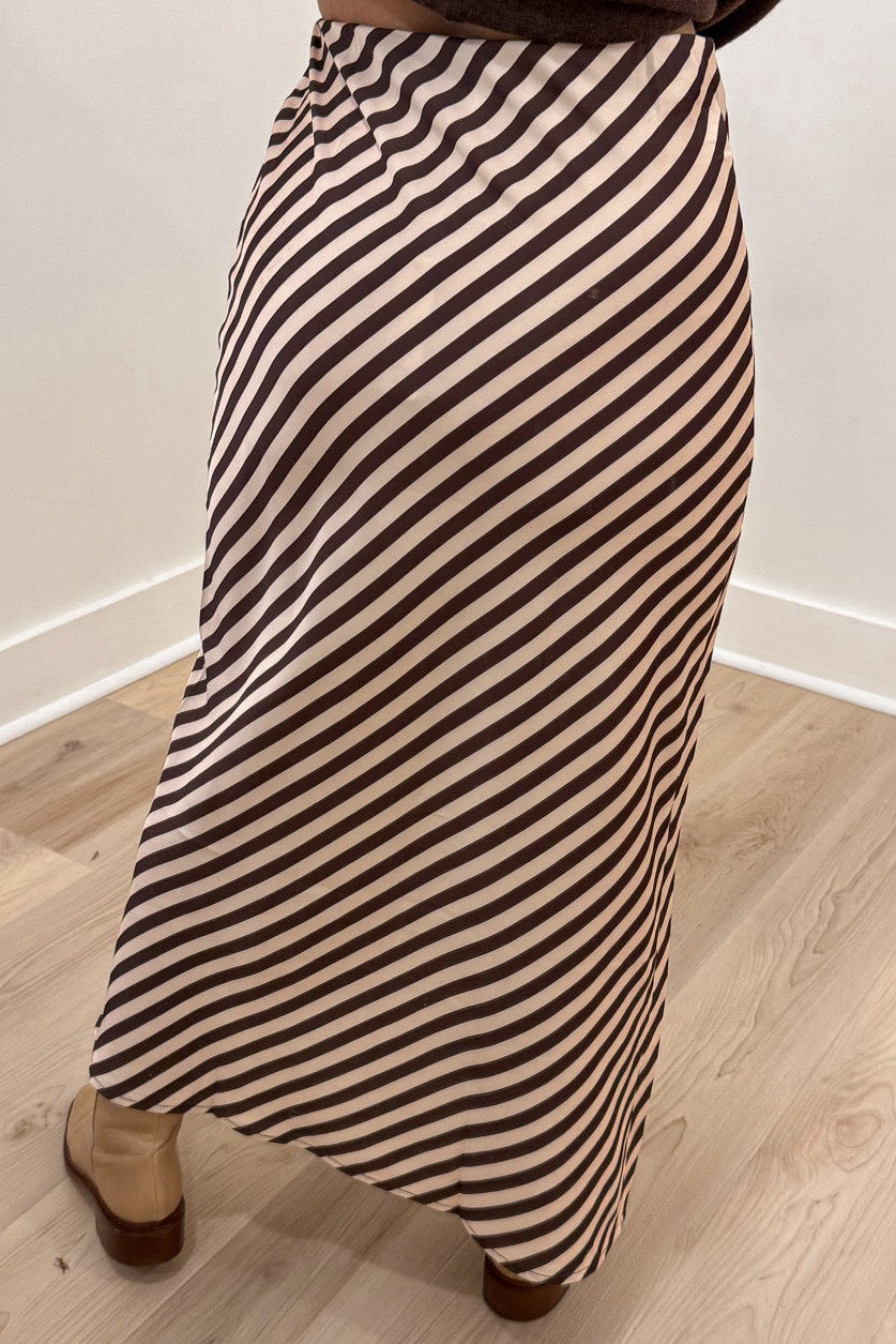 brown and cream asymmetrical diagonal striped lightweight satin midi skirt back view