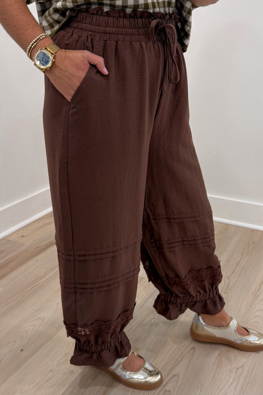 solid brown elastic waist wide leg cropped pants with elastic ruffle cuffed ankles and front pockets