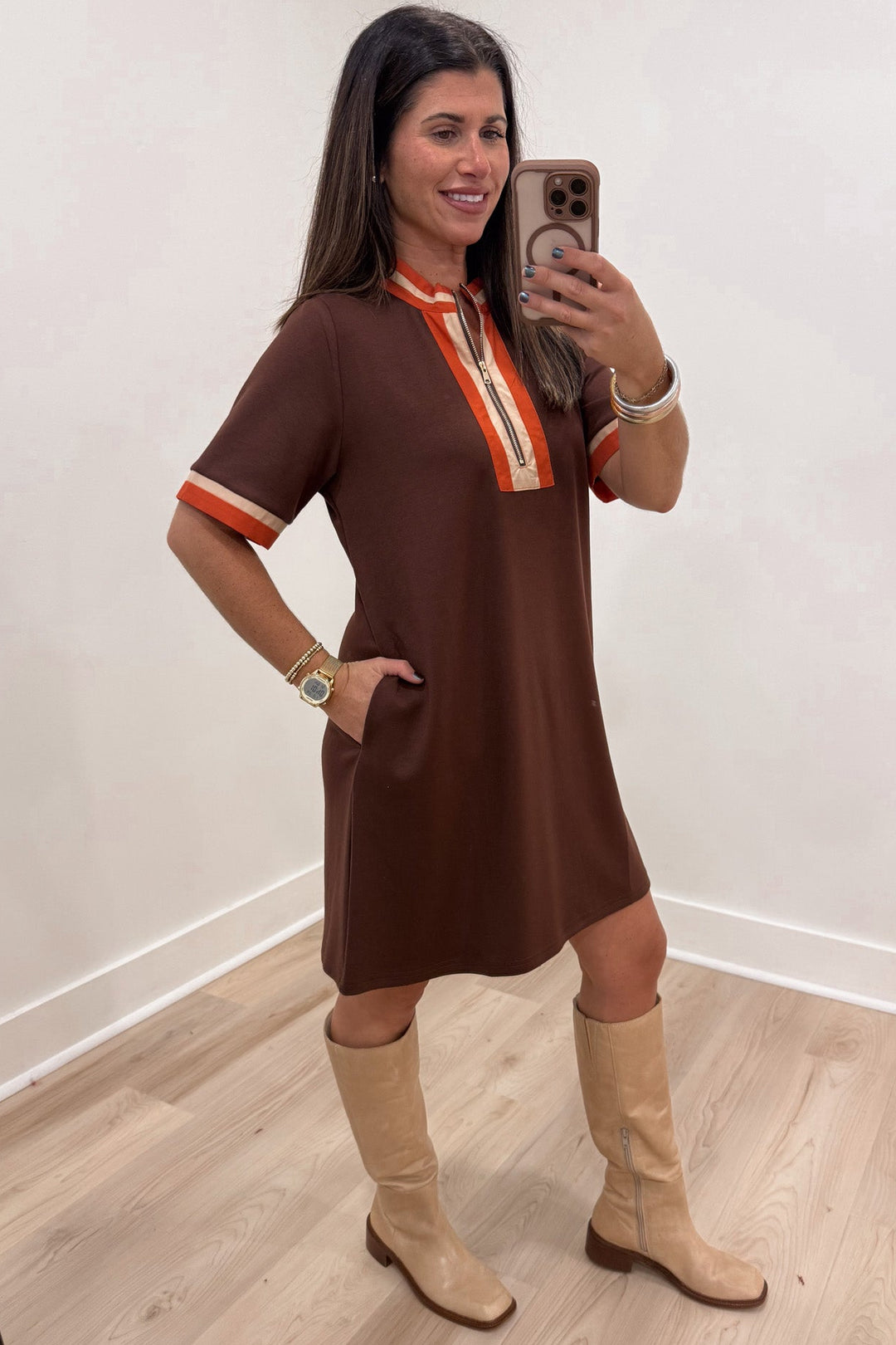 brown with orange and taupe striped trim details mock neck zip front bodice short dress with side pockets