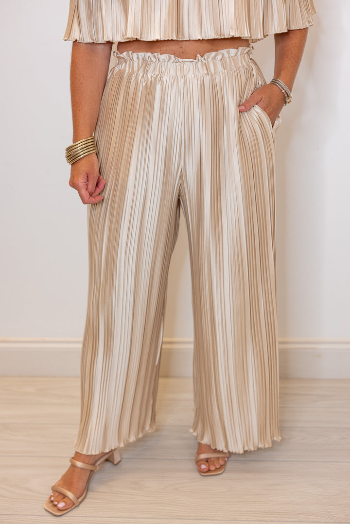 champagne pleated satin palazzo pants