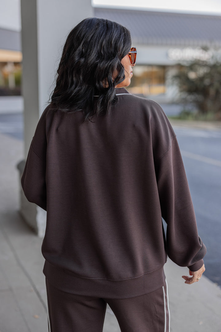 Women's chocolate brown scuba knit top by Rae Mode showing up close back view