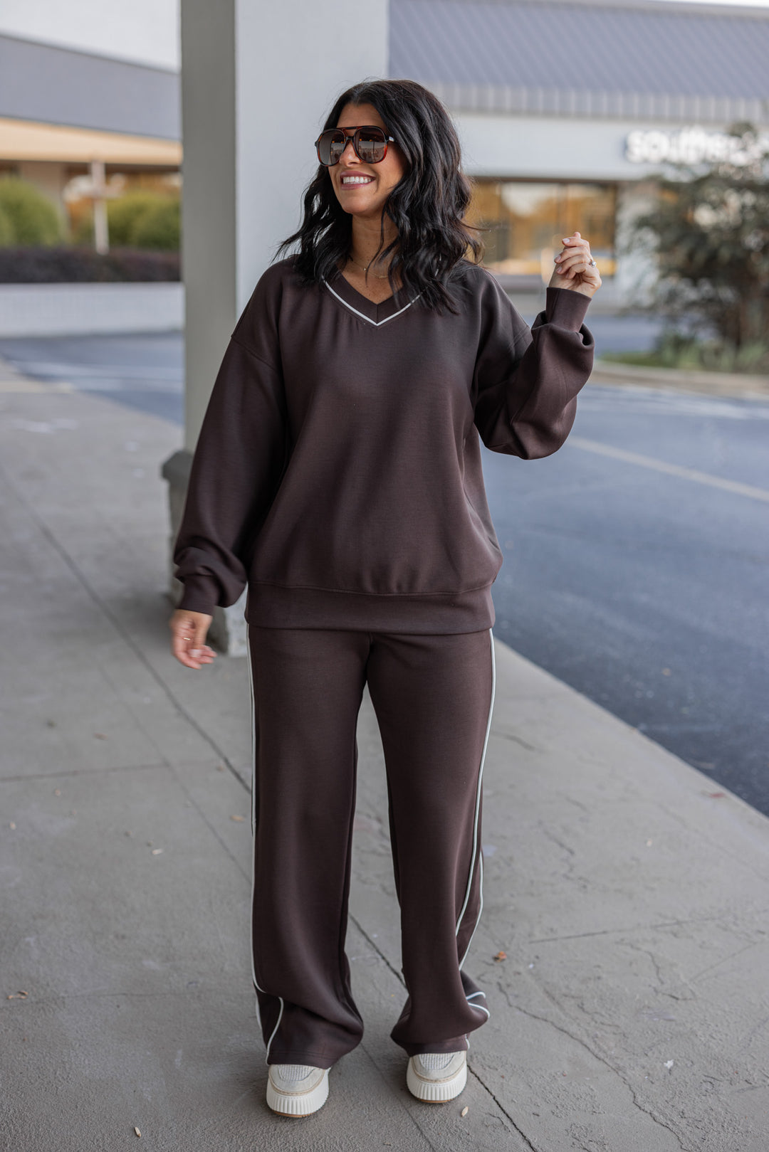 Women's chocolate brown scuba knit top by Rae Mode showing full front view