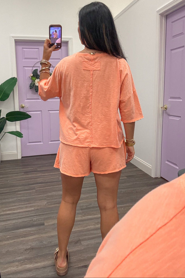 solid light coral reverse seam details top and skort slub knit cotton matching athleisure set