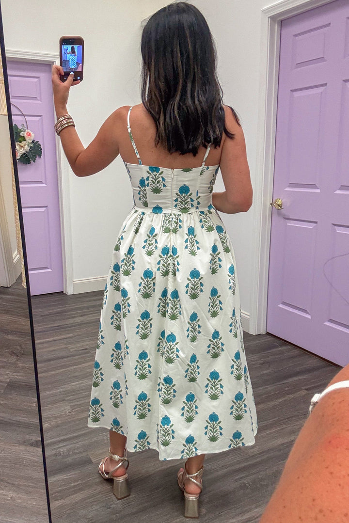 cream blue and olive floral sleeveless midi dress with fitted bodice