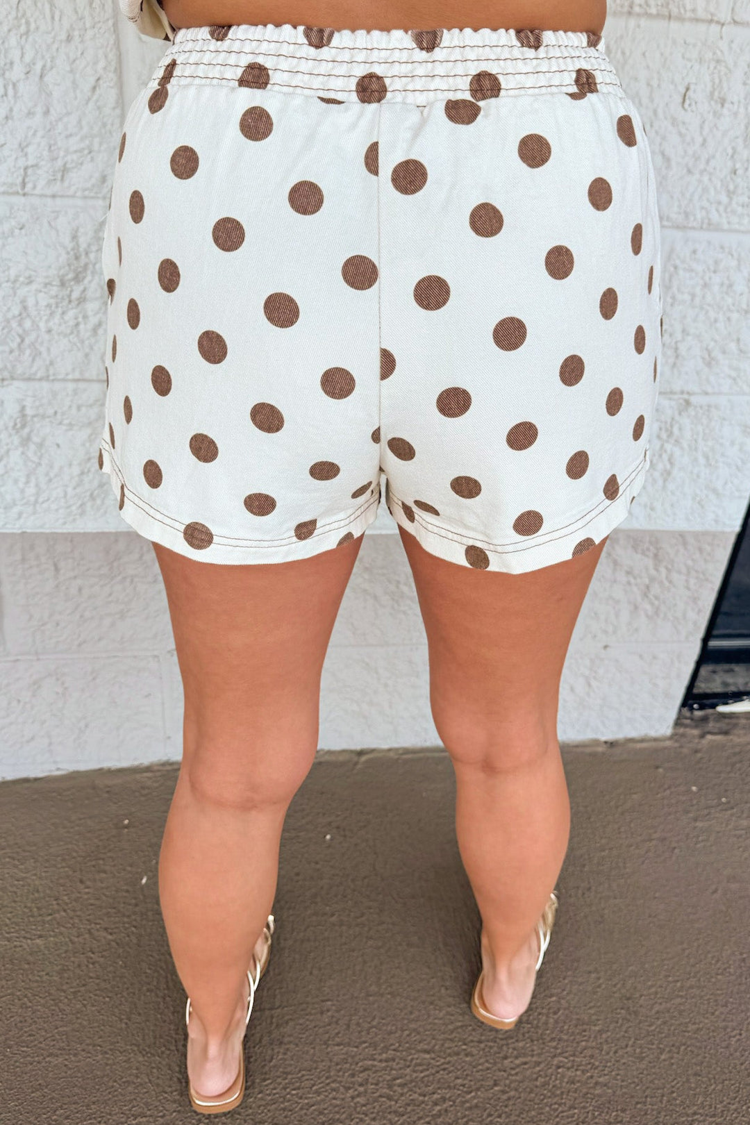 cream with brown polka dot print elastic waistband wide leg denim shorts with reverse stitching details