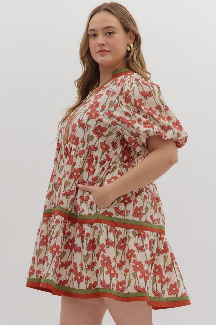 Cream tiered dress with rusted burgundy and olive floral print by Entro in Plus showing side view
