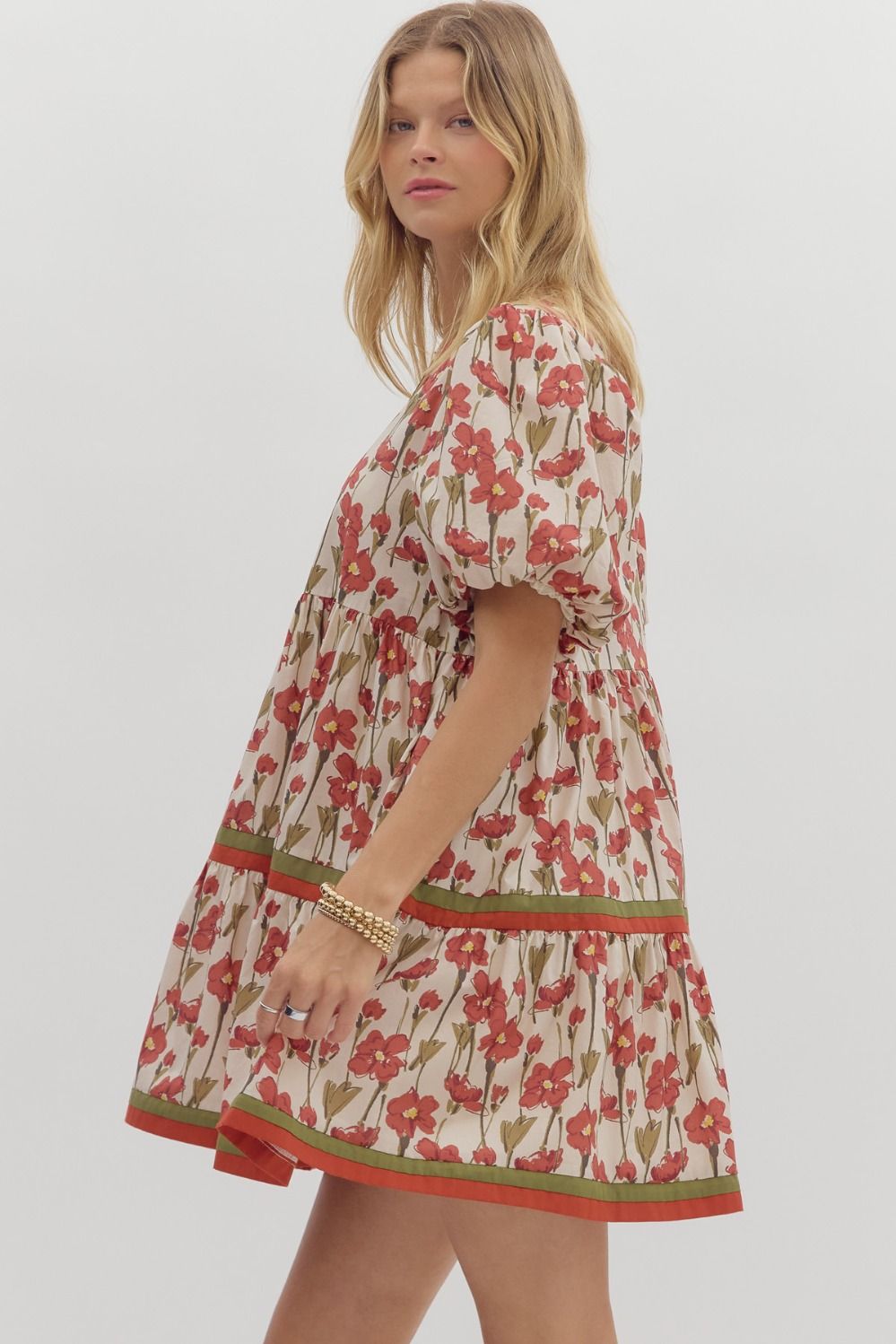 Cream tiered dress with rusted burgundy floral print by Entro showing side view