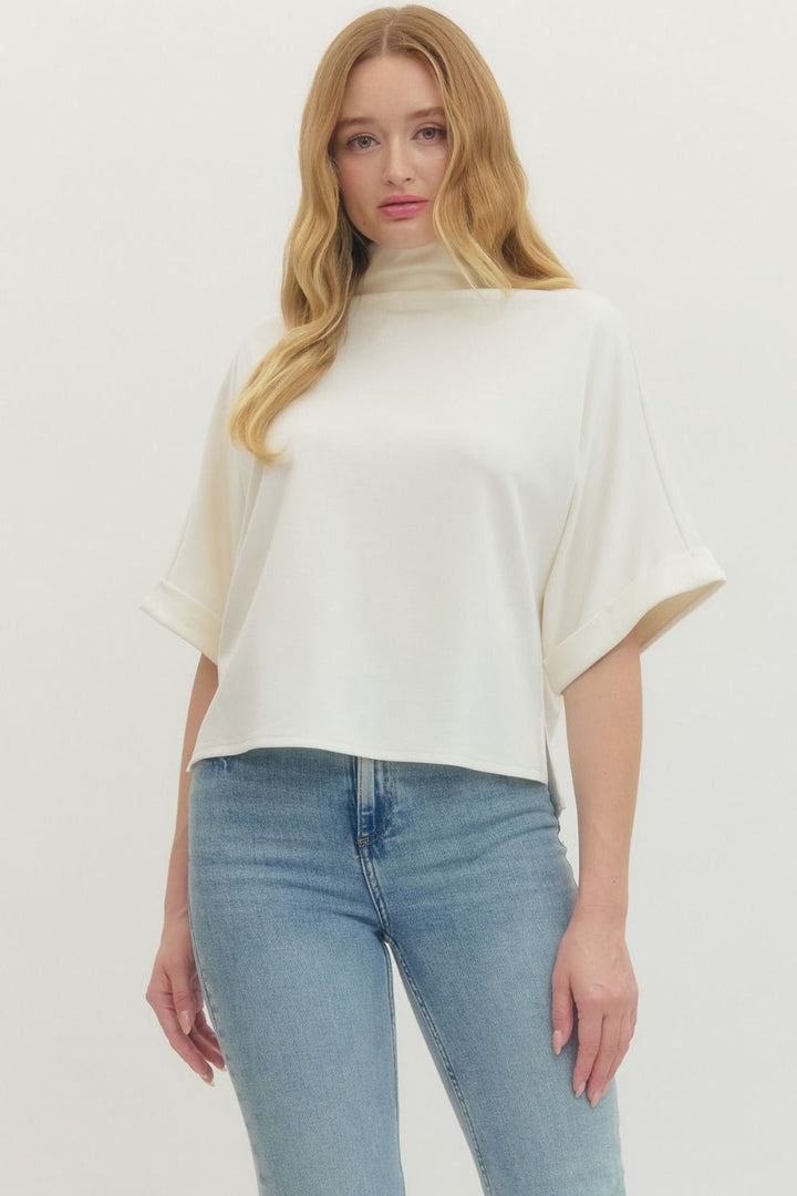 Women's cream scuba knit top with mock neck and dolman sleeves by Entro