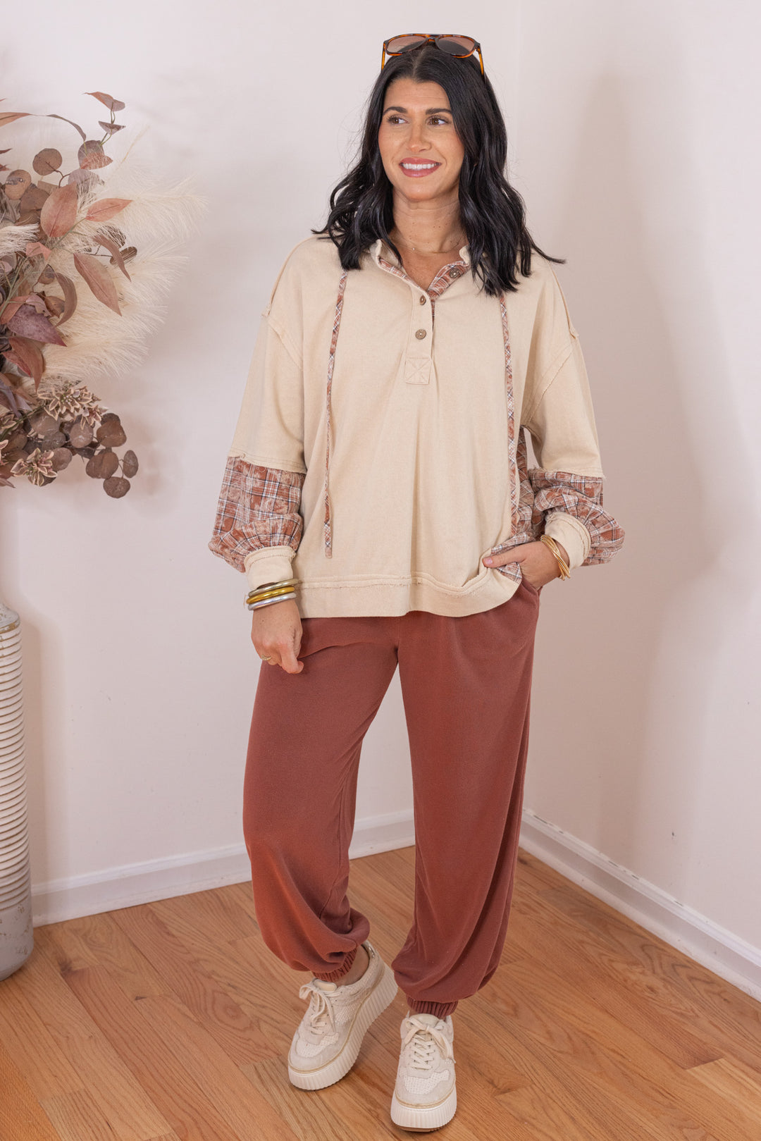 Women's beige french terry knit hooded top with plaid patchwork colorblock by Easel showing full front view