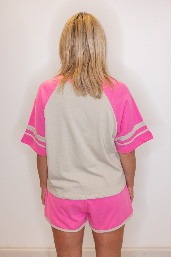 Women's light mocha and punch pink terry knit colorblock top and shorts set by Wishlist showing full back view
