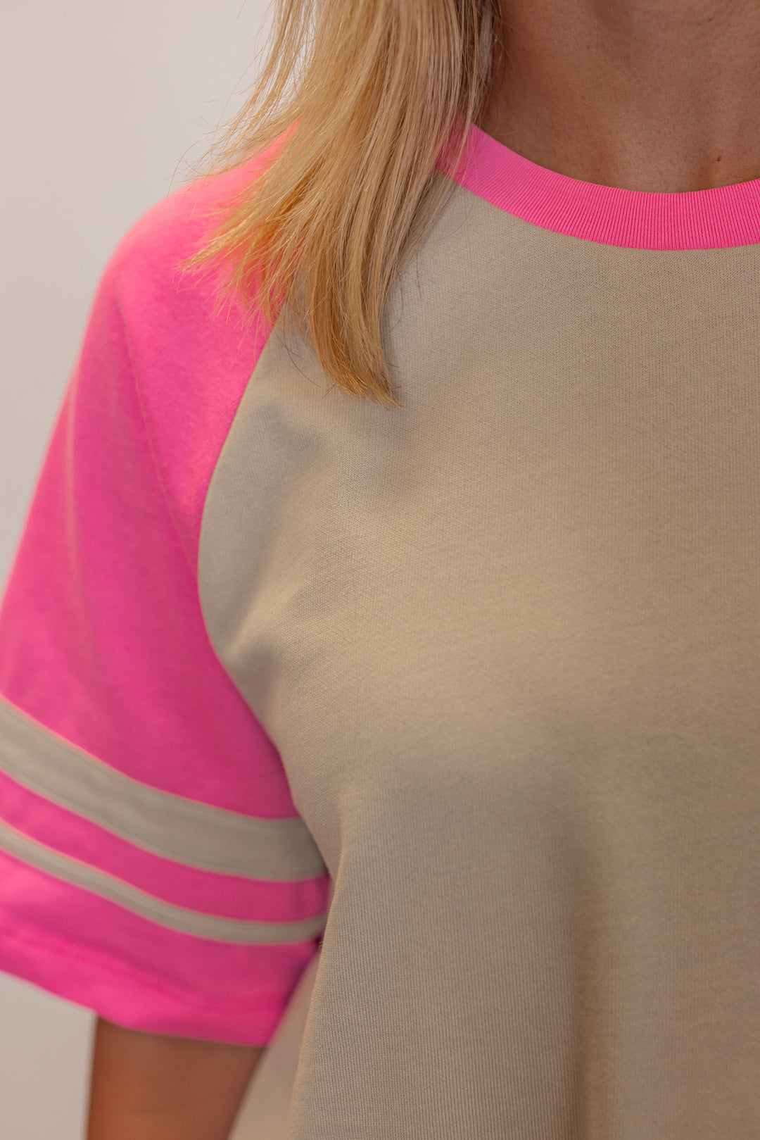 Women's light mocha and punch pink terry knit top and shorts set by Wishlist showing tops colorblock pattern