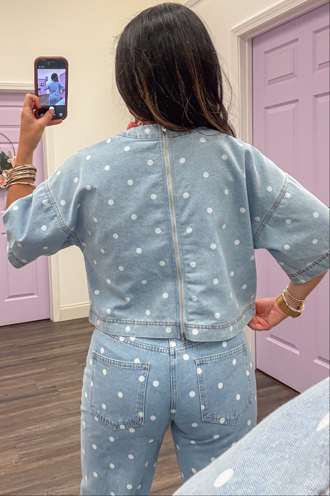 washed blue denim with white polka dot print back zipper closure top
