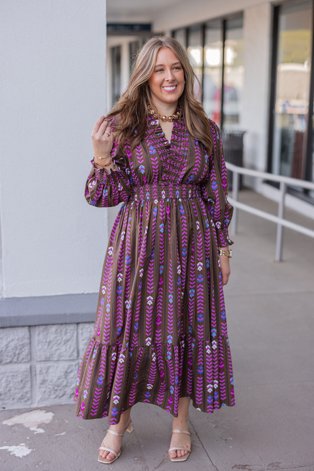 Women's brown ruffle trimmed midi dress with pink multicolor petal print by Umgee, perfect for the office