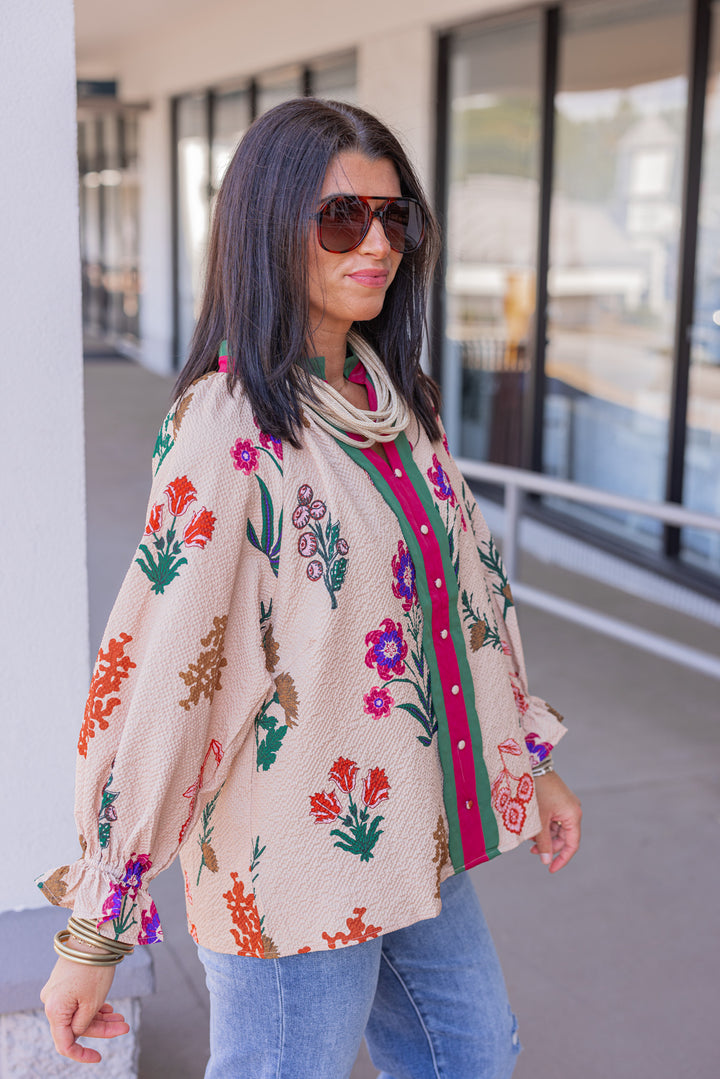 Women's tan textured floral print top with button details by Umgee showing side view