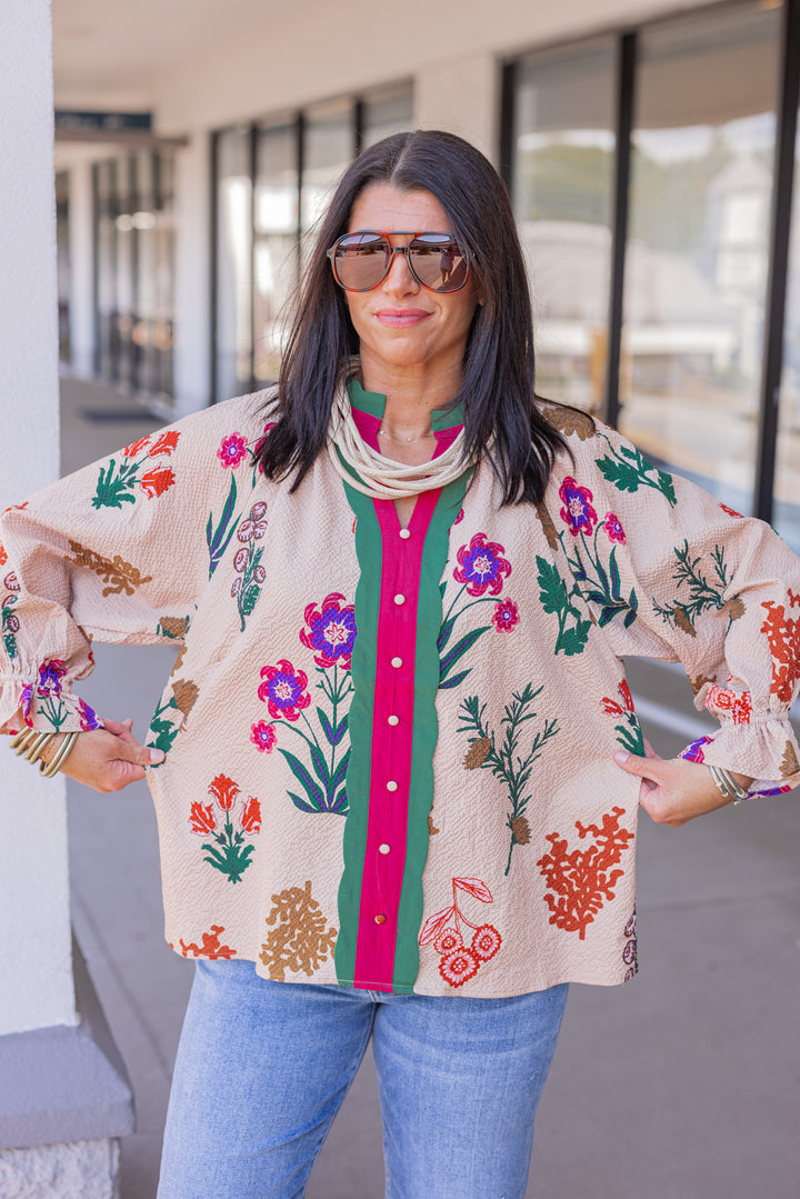 Women's tan textured floral print top with button details by Umgee showing loose silouhette