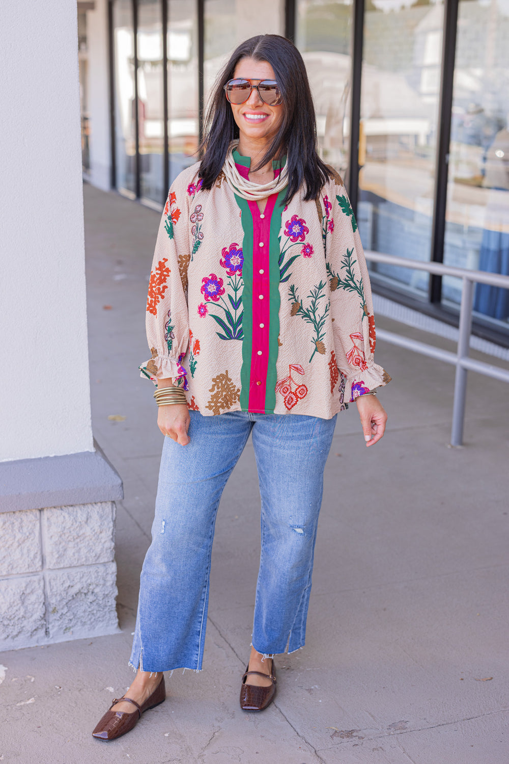 Women's tan textured floral print top with button details by Umgee showing full front view