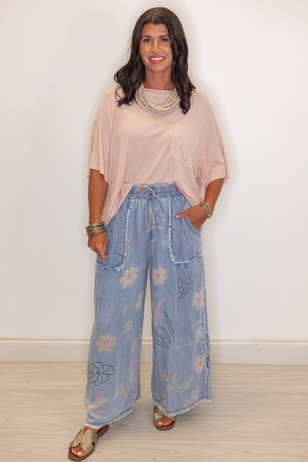 Women's washed light blue floral print wide leg palazzo chambray denim pants by Easel