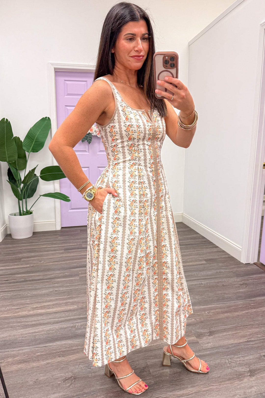 ecru with orange and taupe floral trellis stripes sleeveless pleated midi dress with side pockets