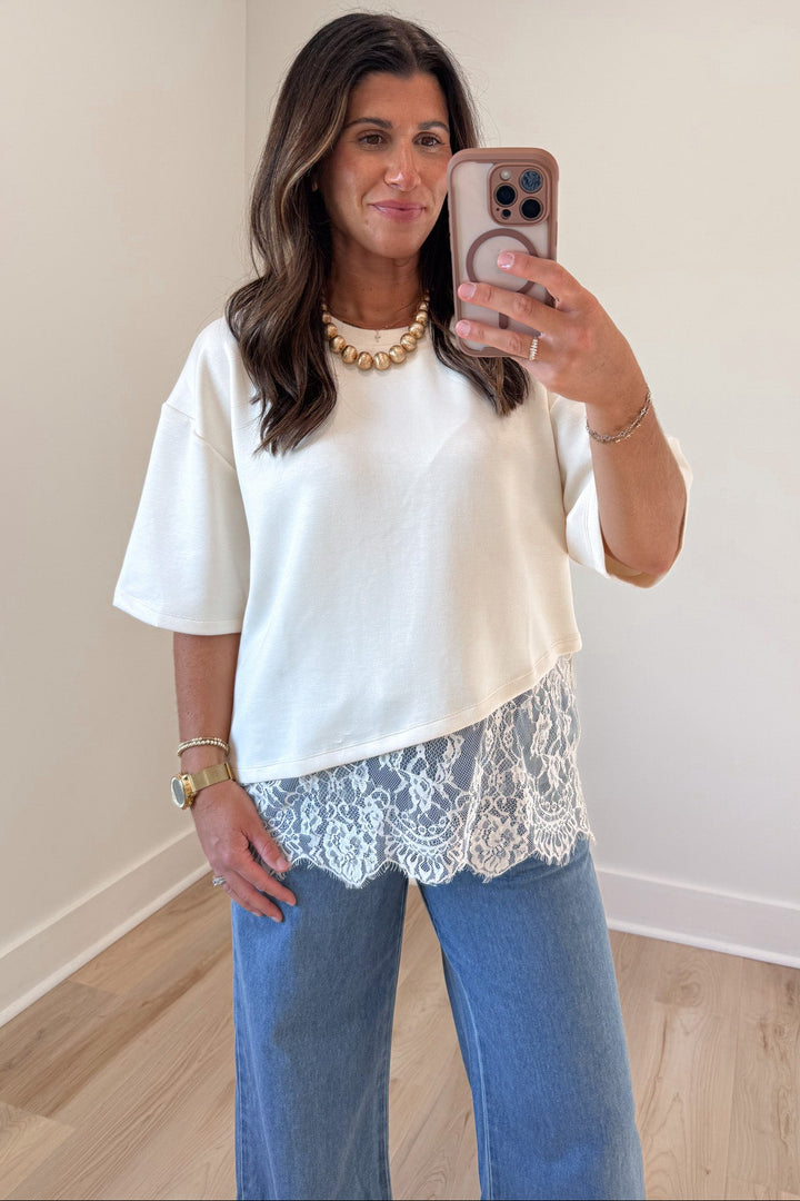 solid ecru asymmetrical tiered lace hem short sleeve crew neckline top