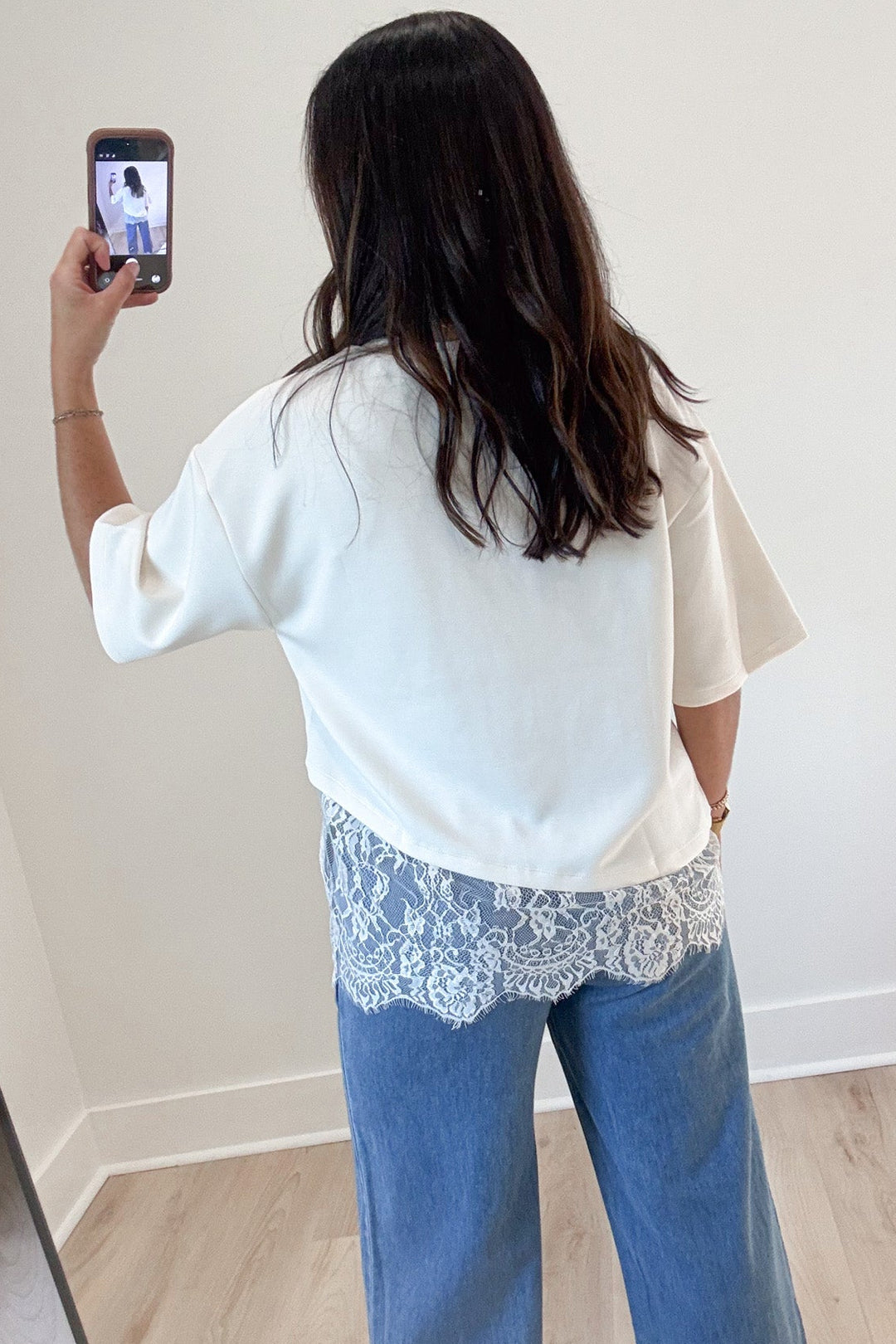 solid ecru scalloped hem short sleeve crew neckline top with asymmetrical lace detail