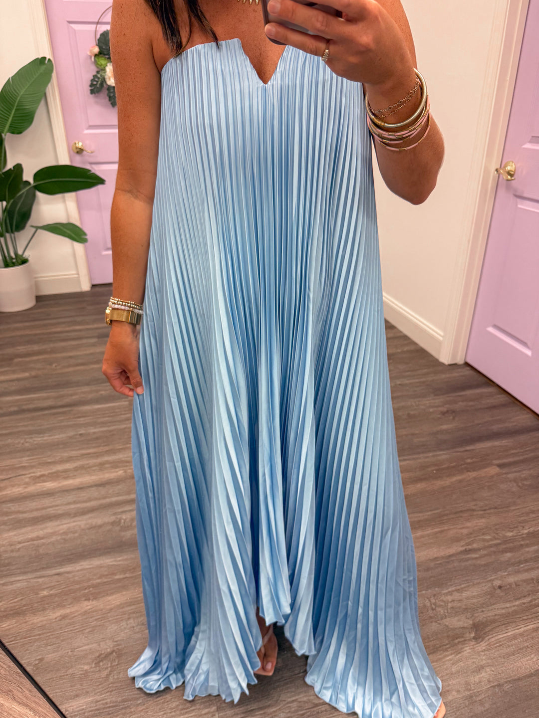 formal light blue satin pleated flowy v neck strapless maxi dress up close