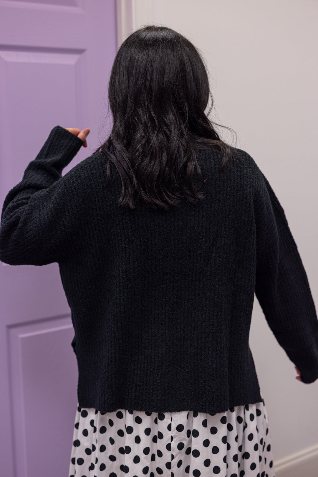 Women's black ribbed knit mock neck sweater top with side slits by Mustard Seed showing up close back view