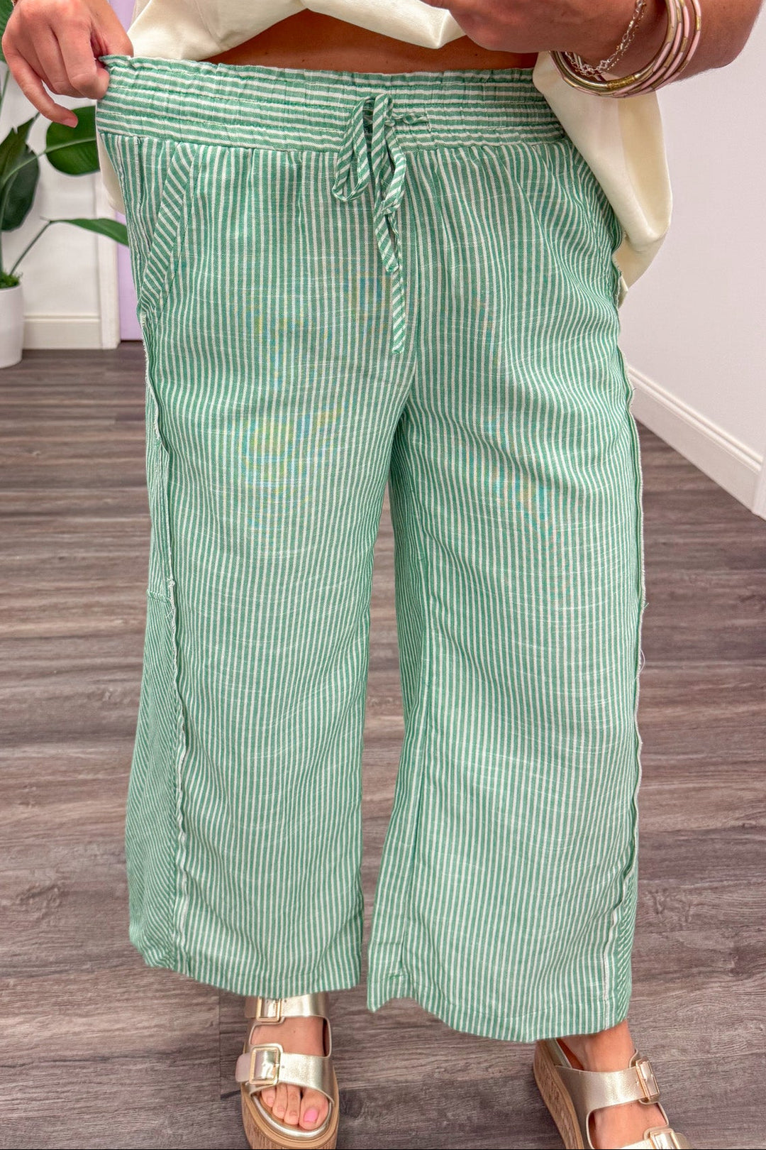 green and cream striped elastic waistband wide leg cropped linen pants