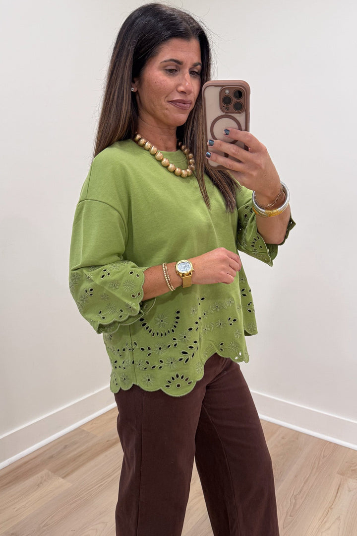 solid grass green floral eyelet accents scalloped hem drop shoulder half sleeve knit top