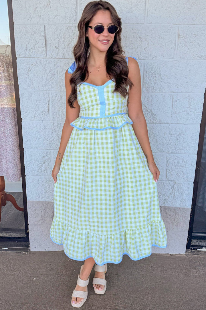honeydew green gingham print with light blue trim details peplum style midi dress
