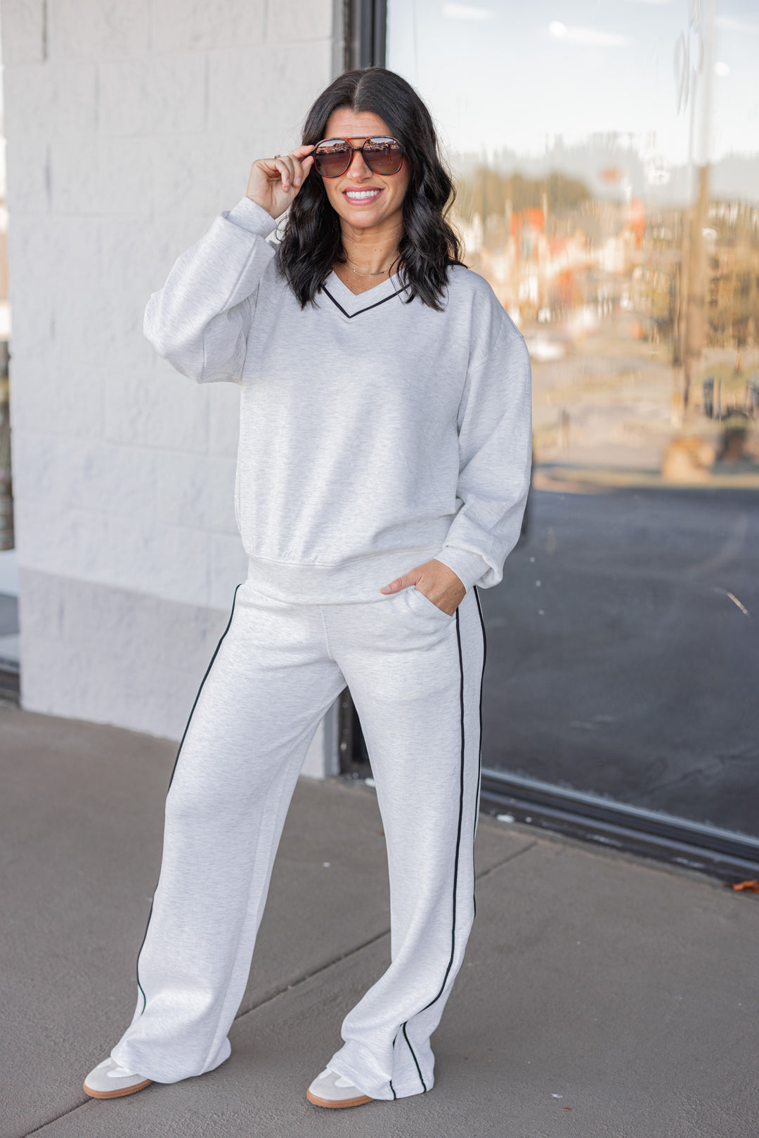 Women's heather grey scuba knit straight leg elastic waist pants by Rae Mode shown with matching top